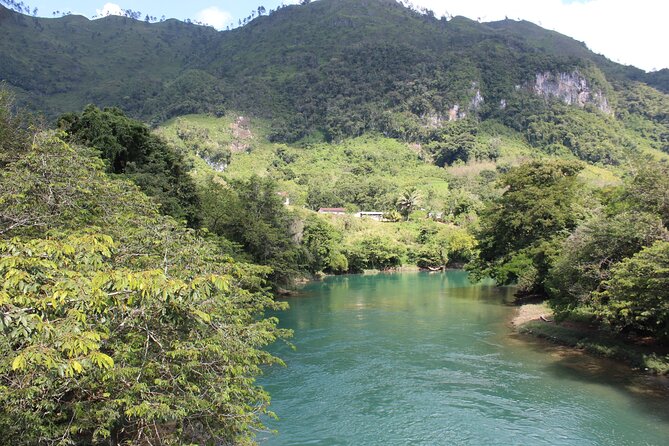Cultural Walk and Natural Beauty near Semuc Champey - Crossing the traditional suspension bridge