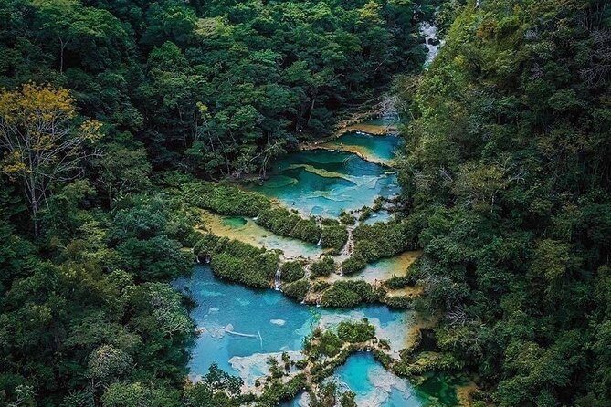 Discover The Paradisiacal Semuc Champey + Kanba Caves - Tour From Cobán - Inside K’anba Caves by candlelight