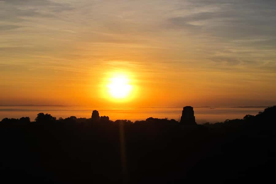From Flores: Tikal Ruins Sunrise Guided Tour - Arriving at Tikal before sunrise
