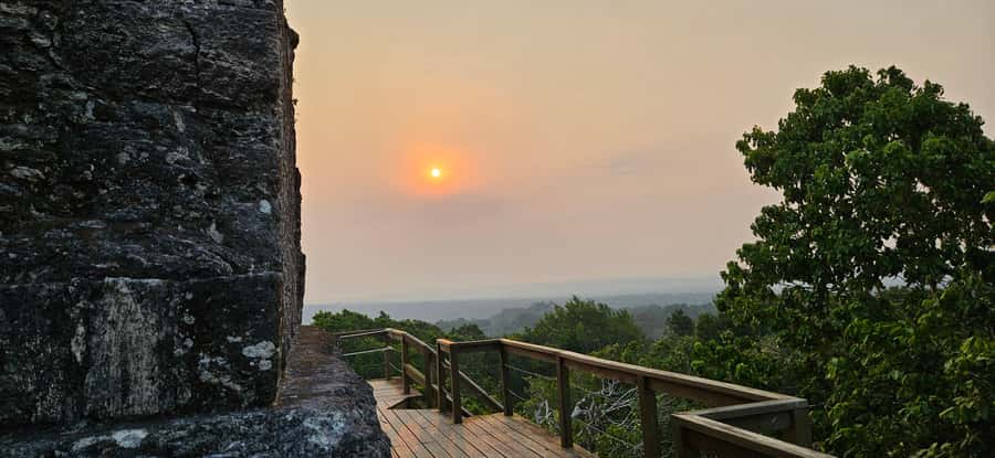 From Flores: Yaxha at Sunset Guided Tour - Climbing Temple 216 for the Red Hands sunset