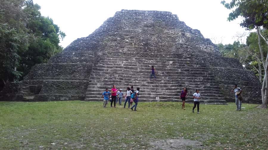 From Flores: Yaxha Ruins Guided Tour - Climbing for the sunset view