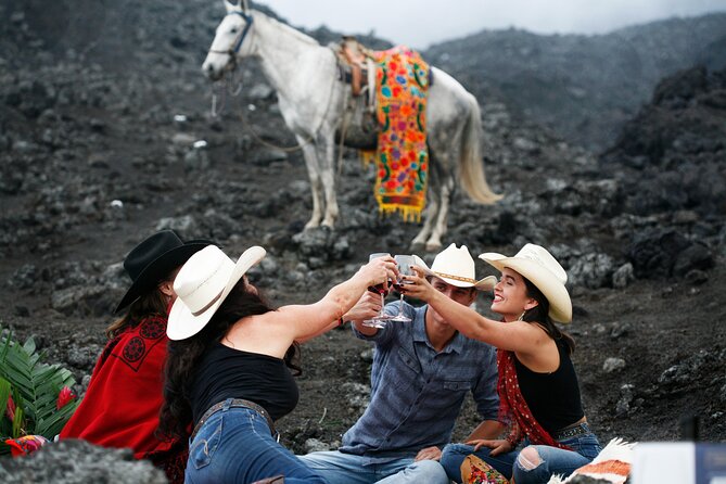 Pacaya Volcano Luxury Sunset Horseback Riding Tour/ Dinner Cooked by-Lava Chef - Riding across lava rock toward Pacaya